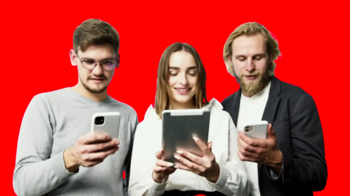 Two young men and a girl between them, each of them holding a phone and she holding a tablet