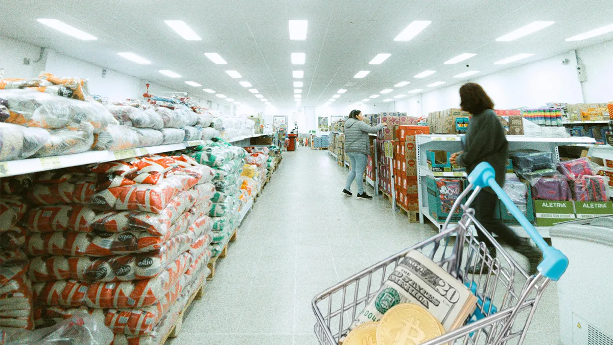 Image of a supermarket showing some dollars and bitcoins in a shopping cart.