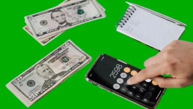 Money, calculator, and a notebook